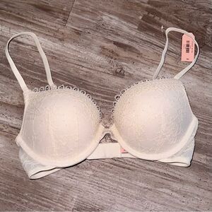 NWT DOBREVA ivory deep plunge